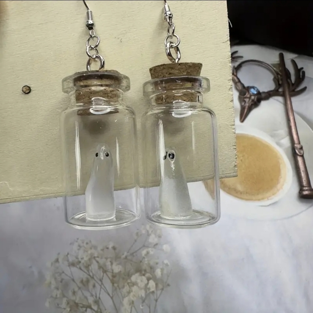 Ghost in a bottle dangle earrings NWT